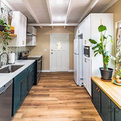 A remodeled, maximalist, Spanish-style kitchen