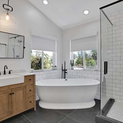 A Modern-style bathroom featuring a freestanding bathtub