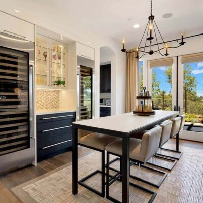 A Spanish-style kitchen leading to a back patio