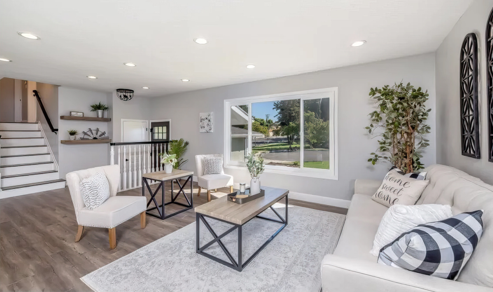 Bright ADU living with large window and modern furniture