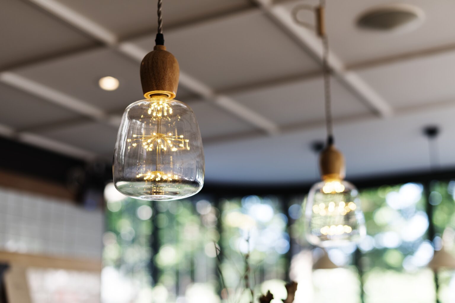 Decorative glass pendant lighting hanging in a contemporary home
