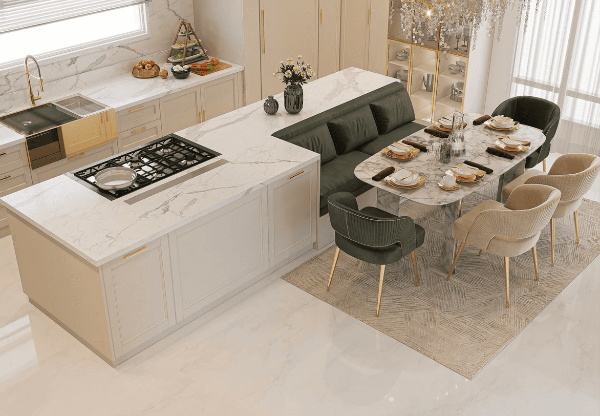Modern kitchen island with marble countertops and built-in banquette seating for dining