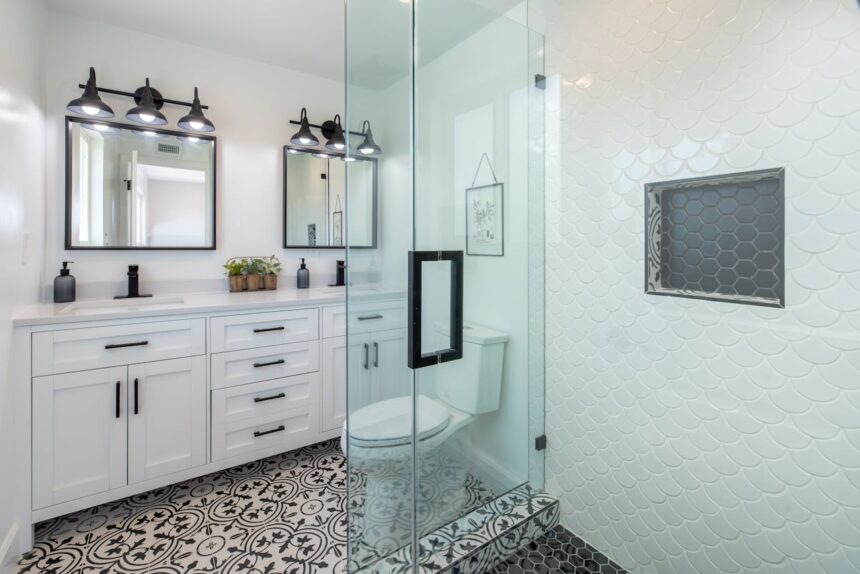 modern bathroom with printed tile floor and black finishes