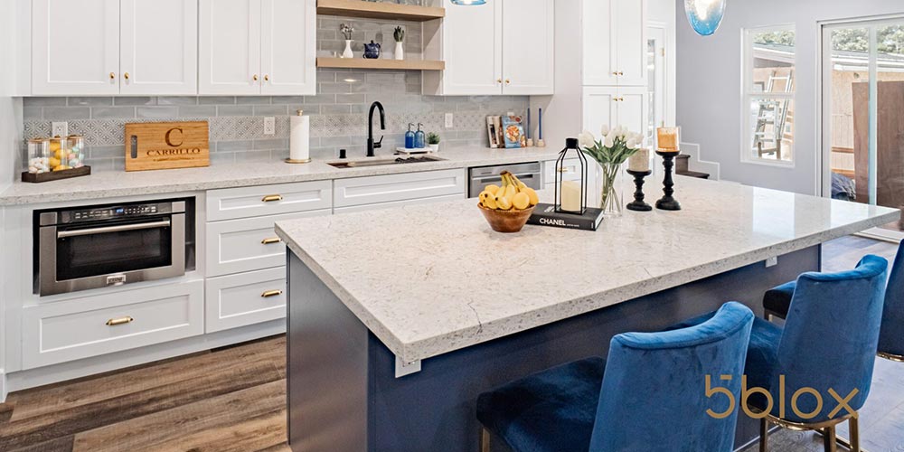 A modern kitchen featuring a central island