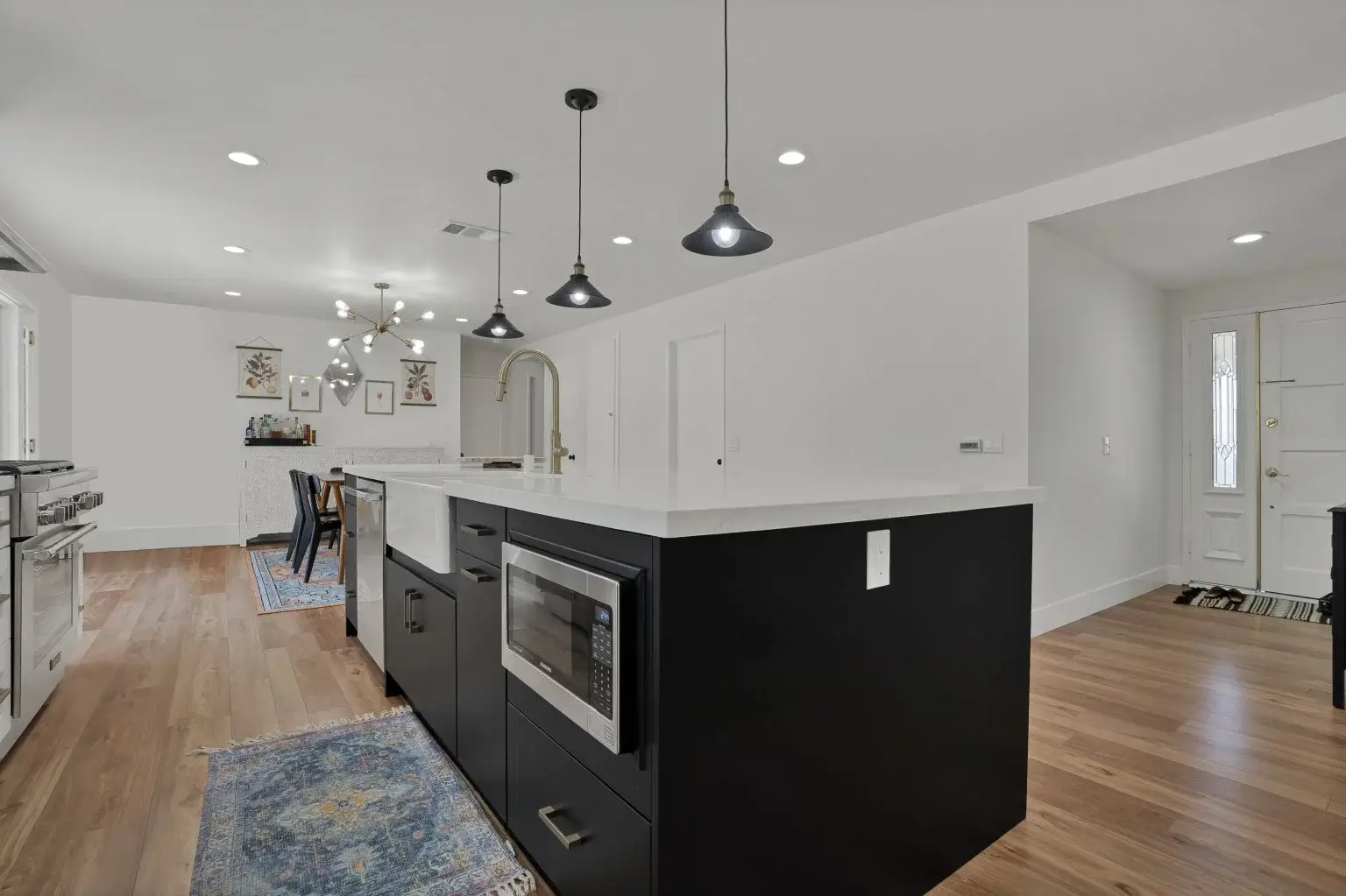 Modern open-concept kitchen with black island in Irvine, CA