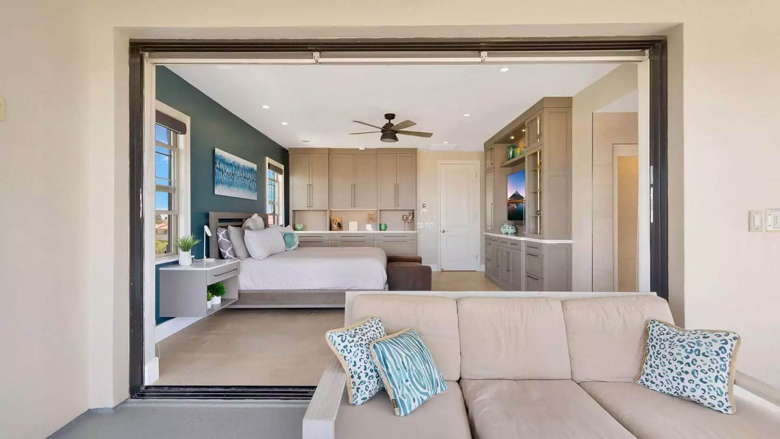 Photo of a bedroom and back of a living room remodeled by an interior remodeling company