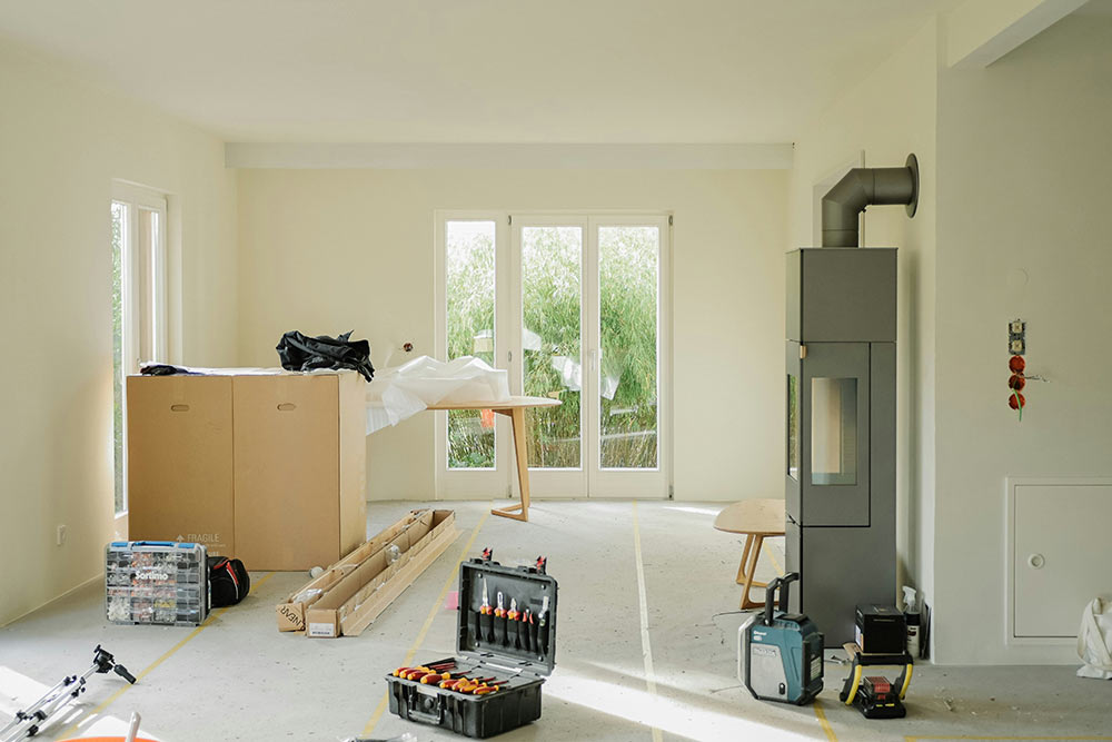 Empty bedroom with power tools during the home remodeling process