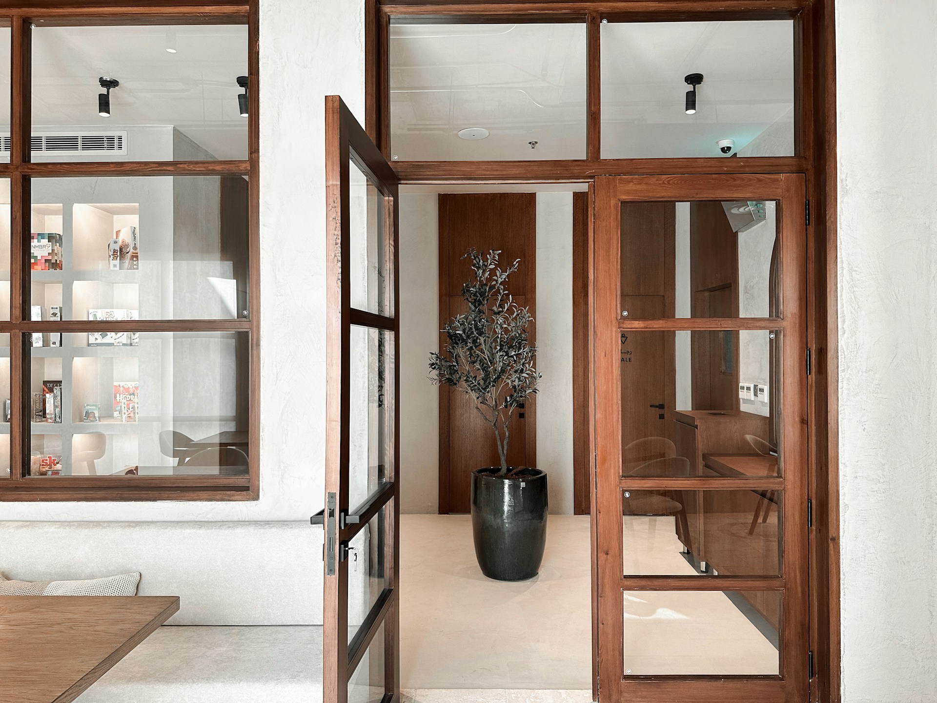 Warm Mahogany wood doors and interior framing with glass panels